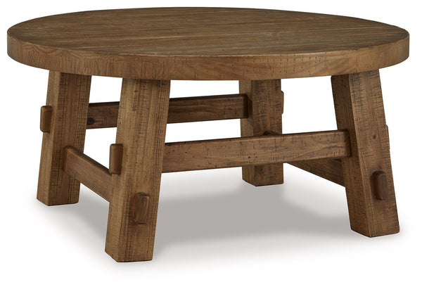 Mackifeld - Round Cocktail Table - Warm Brown