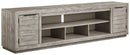 Naydell - XL TV Stand w/Fireplace Option - Gray