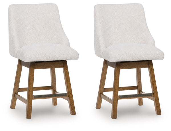 Cabalynn - Oatmeal / Light Brown - Upholstered Swivel Barstool (Set of 2)