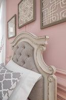 Realyn Upholstered Bed